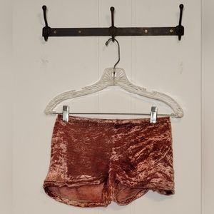 Vintage copper colored velvet hot pants with some stretch. Waist 24. Hip 34.